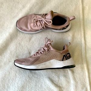 Classy rose Nike runners with a glow